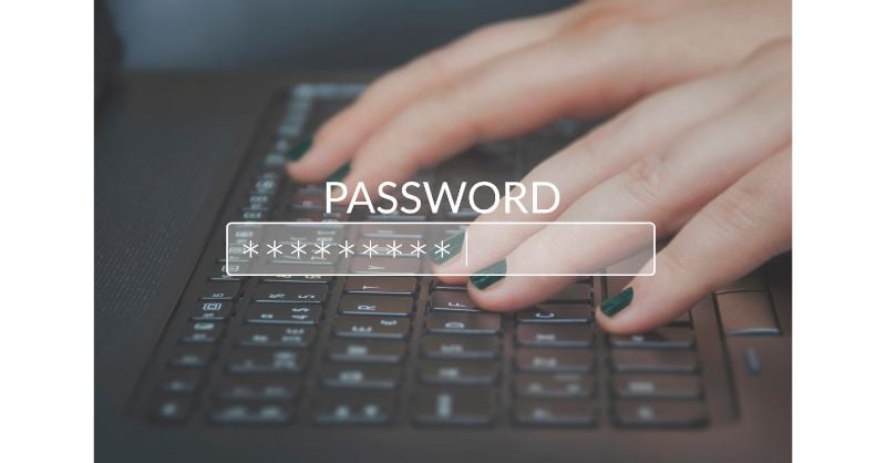 On the eve of world password day the blog talks about 5 ways to strengthen your password security and this accompanying image shows a woman's hand with black painted nails typing on a black keyboard. Superimposed over the top is an image of a password asterisked out on a transparent block, with the word PASSWORD above it.