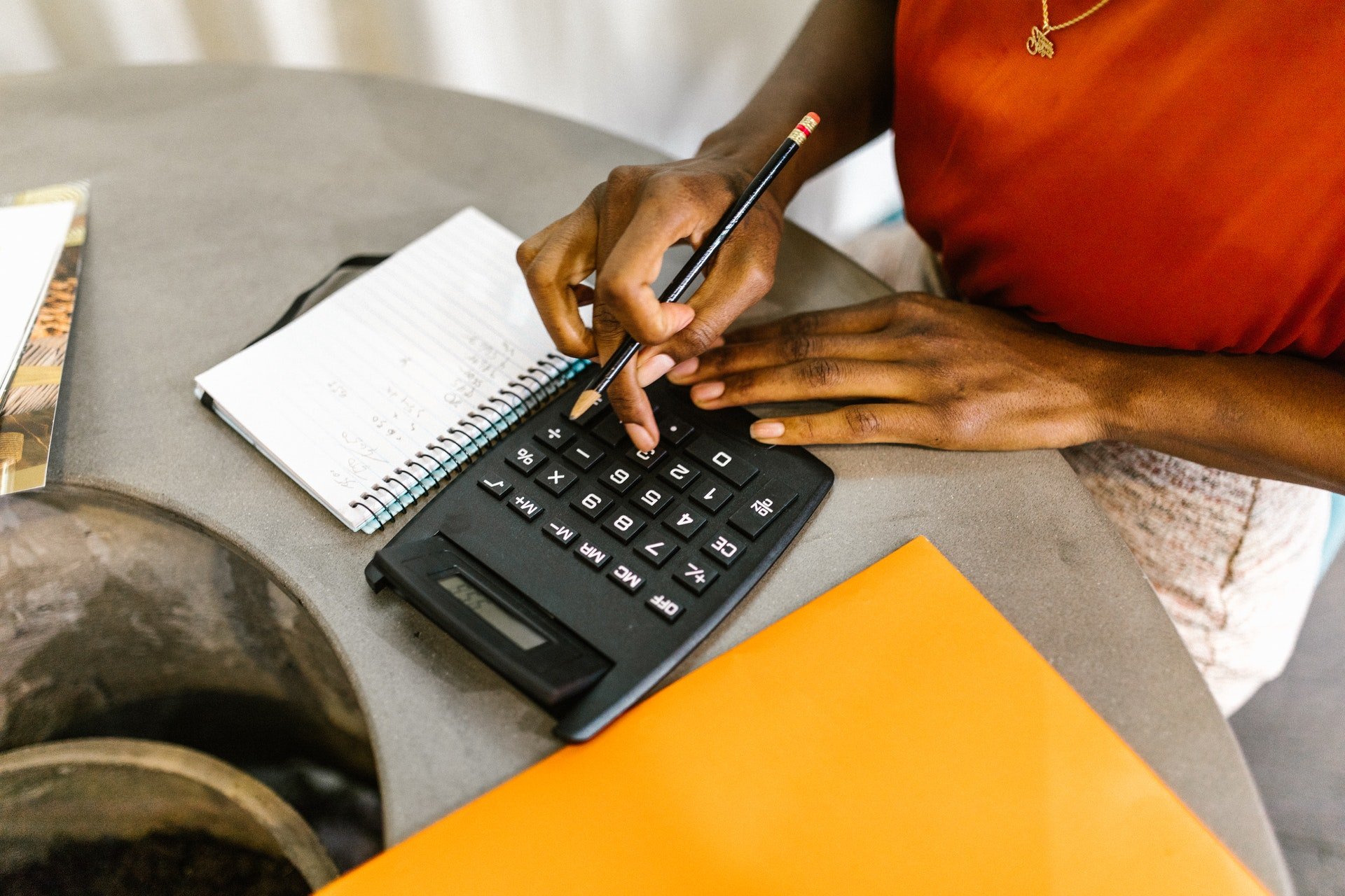 A woman using a calculator