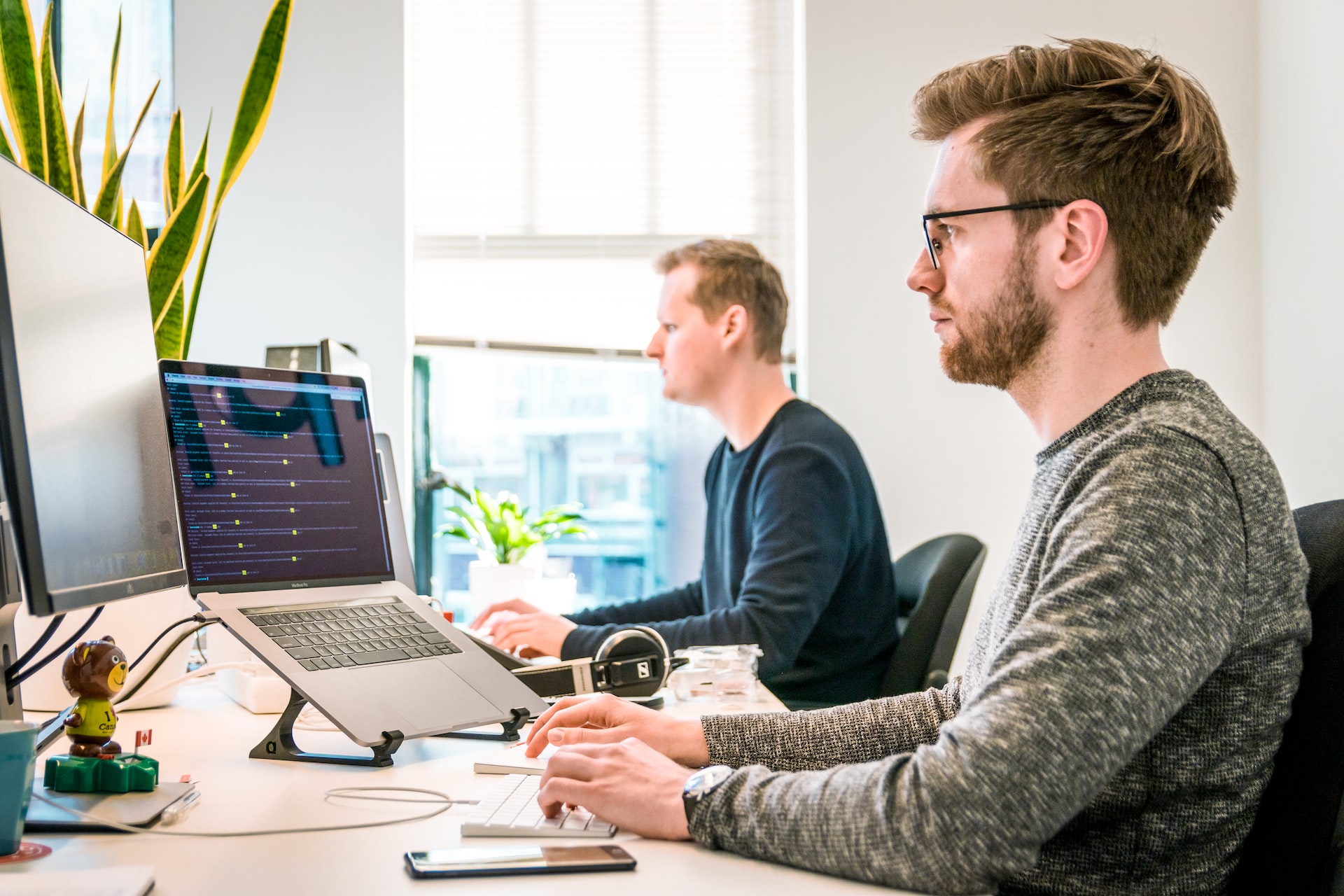 Office workers at laptops